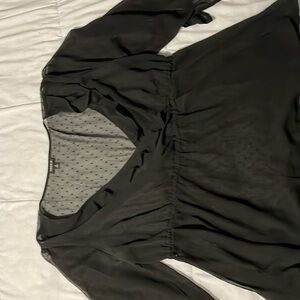Torrid beautiful sheer top , ruffled in bust .like new condition
